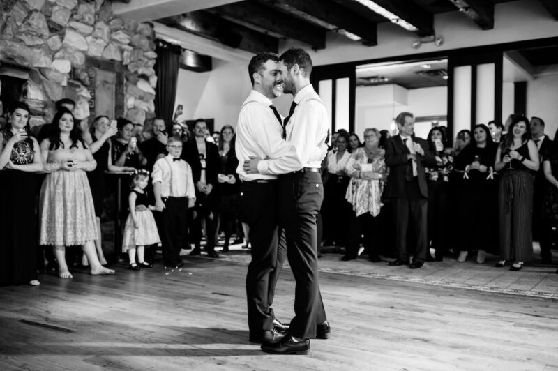 Just married couple dances their first dance at Osteria via Stato