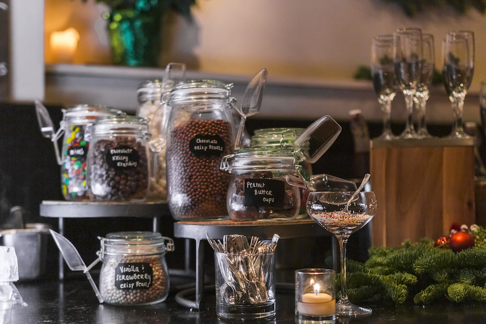 apothocary jars of candies and toppings for gelato bar