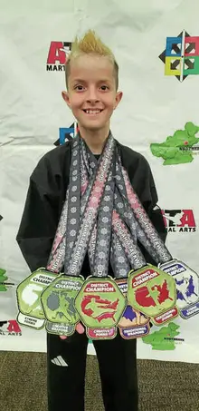Ross Township 5th grader captures 4 regional titles in Taekwondo