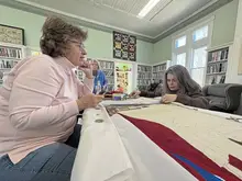 Tapestry depicting Pennsylvania’s history as one of original 13 colonies coming to life in Shaler