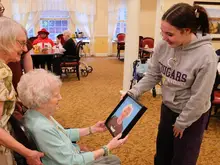 Baldwin High School students paint portraits of centenarians