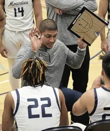 Former college coach takes reins of Riverview boys basketball program