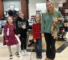 'It's all about giving back': Macy's partners with Gateway School District to provide winter gear