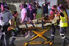 Gunmen kill at least 11 people in attack on Jewish holiday event on Sydney's Bondi Beach