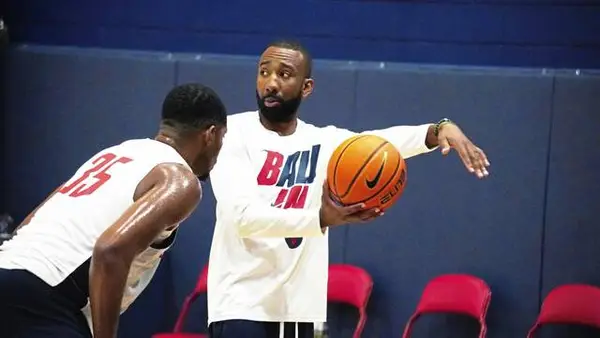 Dru Joyce III takes over Duquesne basketball amid new heights and