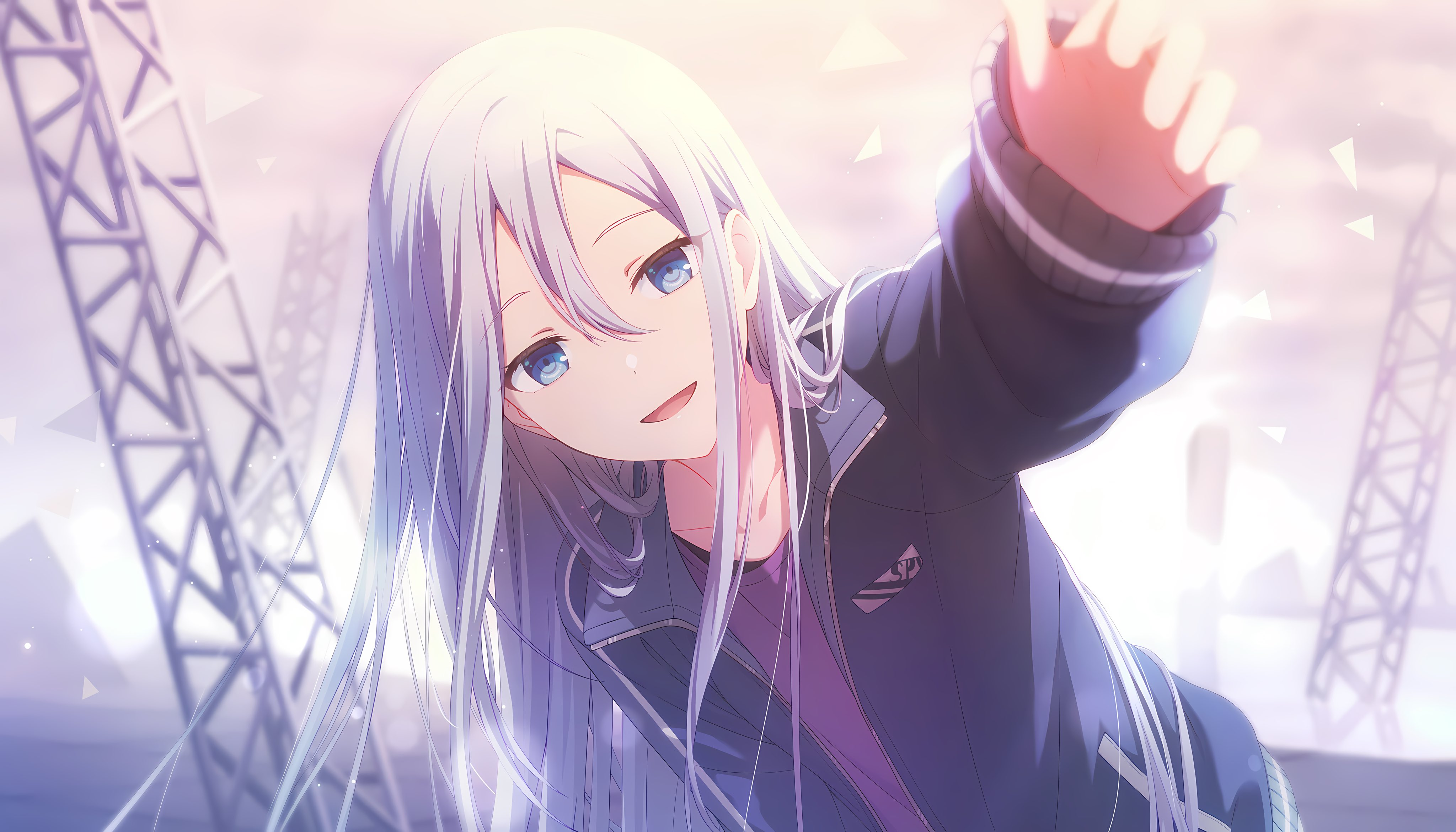 the image shows a smiling anime girl with long white hair and blue eyes. she is wearing a dark blue jacket over a purple shirt and is reaching out towards the viewer with one hand. the background features a stage setting with metal beams and soft, pastel lighting. there is a logo on her jacket. the character is yoisaki kanade from the project sekai franchise.