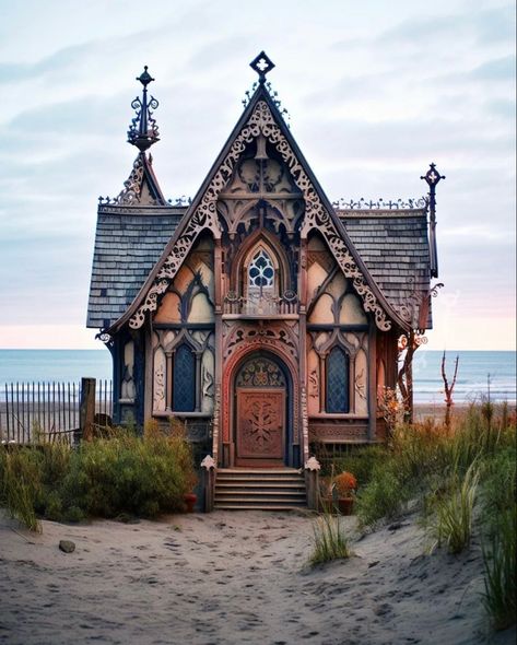 an ornate, gothicstyle cottage sits on a sandy beach with the ocean in the background. the cottage has intricate carvings and details, and a set of stairs leading to the front door. the walls are made of stone and the roof is tiled. the sand in the foreground is dotted with beach grass. the sky is overcast with a hint of sunset colors.