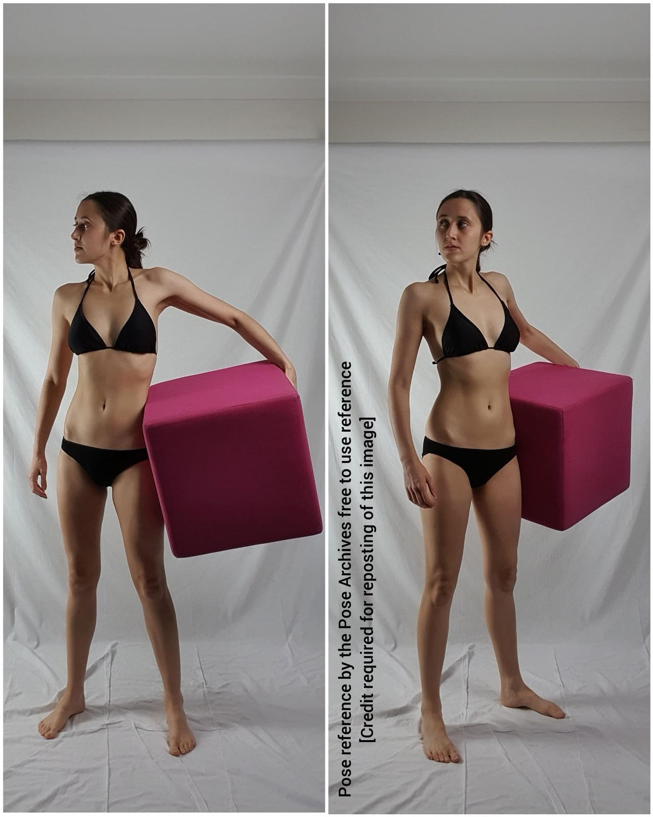 a woman in a bikini is posing for a reference photo. she is holding a pink cube in her right hand. the background is white.