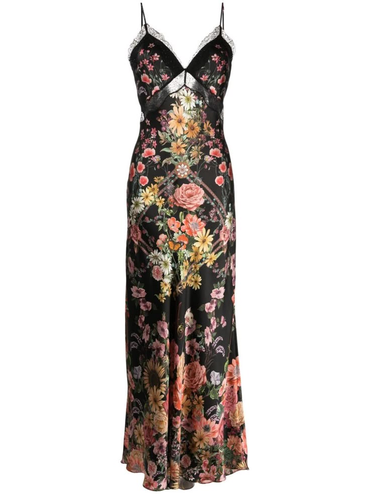 a floorlength black dress with a vibrant floral print. the dress has a slip dress style with delicate spaghetti straps and lace trim detailing around the neckline. the floral design features a mix of roses, daisies, and other colorful blooms.