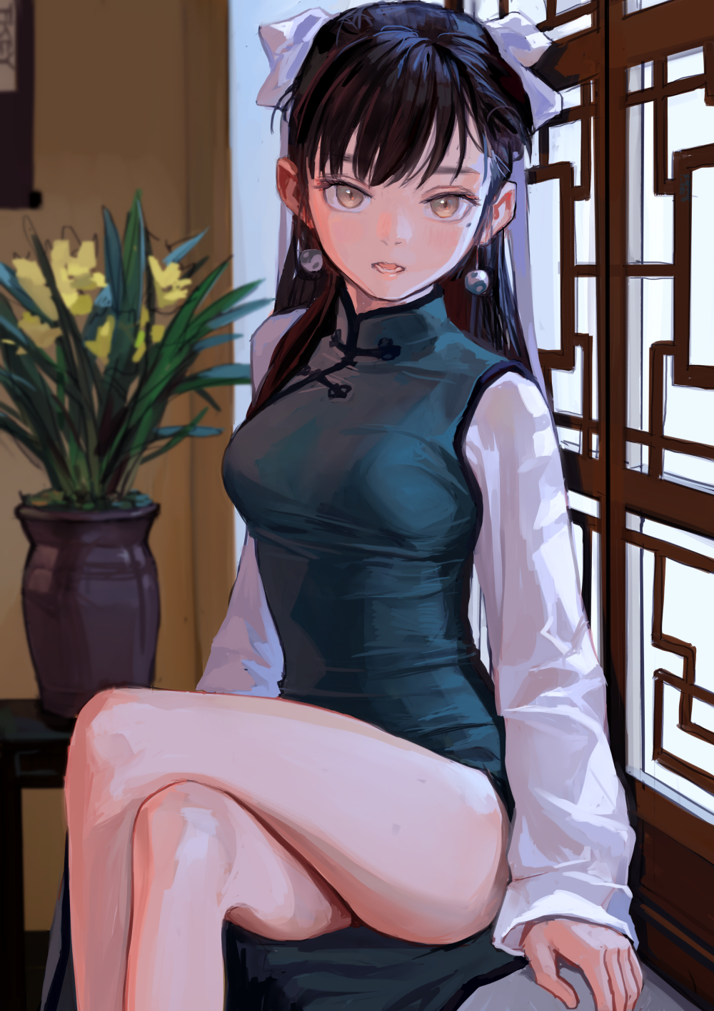 an anime girl is sitting, wearing a dark green cheongsam dress with white long sleeves. she has dark hair with white ribbons, earrings, and is sitting next to a vase of yellow flowers and a decorative wooden screen.