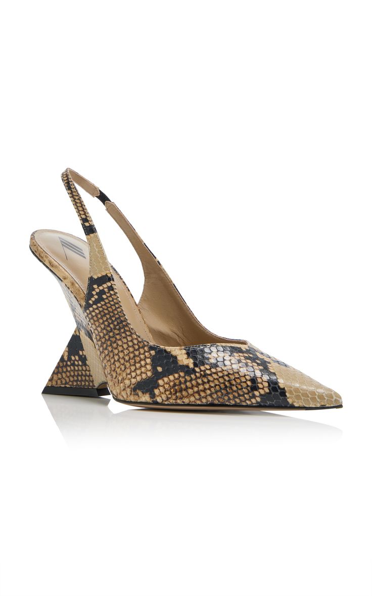 the image showcases a pair of women's designer slingback heels. the shoes feature a pointed toe and are crafted from beige snakeskin or pythonprint leather.  the heel is a distinctive geometric wedge shape, and the overall style is modern and elegant. the shoes are presented against a plain white background, emphasizing the details of the shoe design.