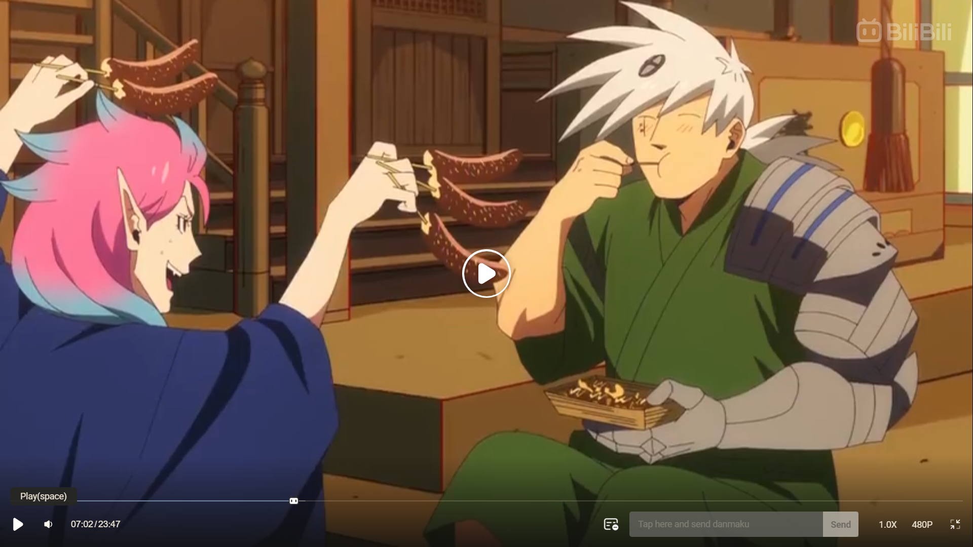 the image shows a screenshot from what appears to be an anime. two characters, a male with spiky silver hair and a female with vibrant pink and blue hair, are enjoying food together. they sit in a warmly lit space with traditional japanese architectural elements, possibly a food stall or restaurant. the male character, dressed in green, eats from a skewer of dango (japanese dumplings) while the female character, wearing a blue and black robe, playfully offers him another skewer.  a bowl of food sits between them. the scene conveys a lighthearted and friendly atmosphere.
