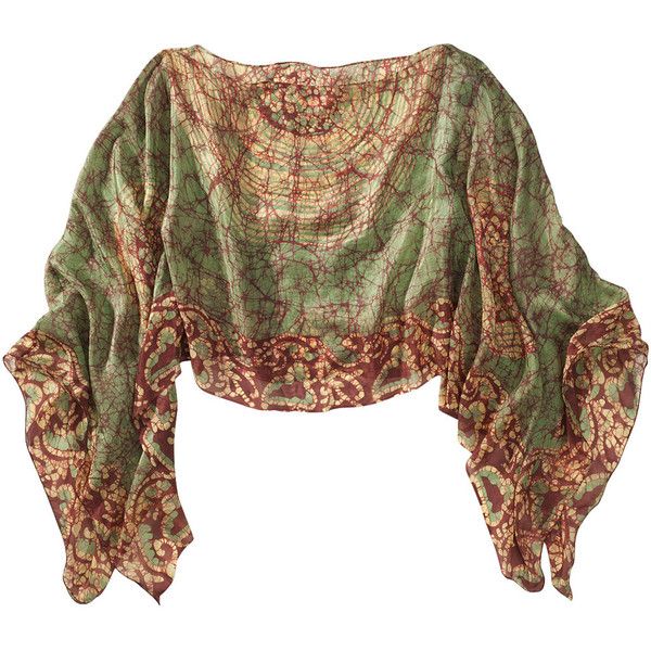 a beautiful, green, red and brown silk scarf. the scarf is made of a soft, luxurious fabric that is both delicate and chic. it has a vintage, bohemian style with a paisley pattern. the scarf is perfect for adding a touch of elegance to any outfit.