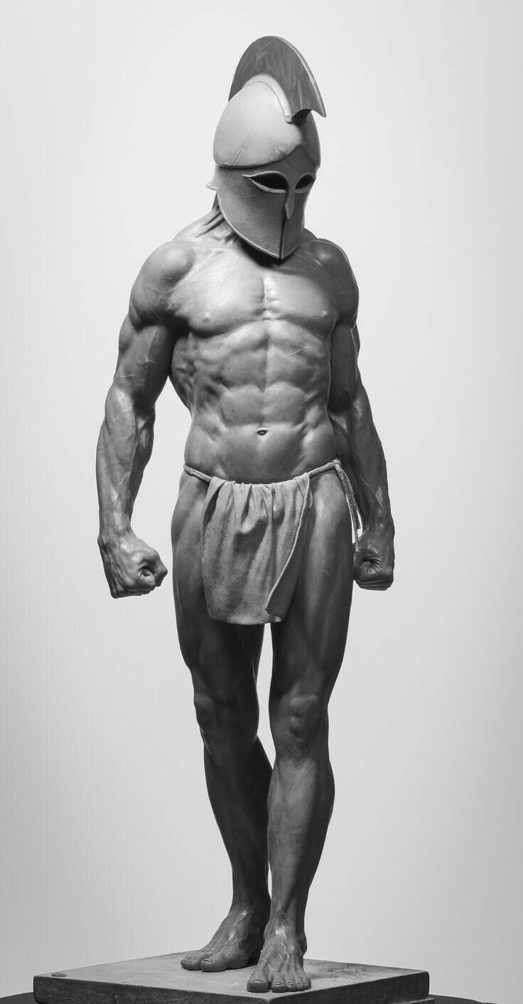 a black and white sculpture of a muscular male figure wearing a spartan helmet and a loincloth. the figure is standing on a square platform. the sculpture showcases detailed anatomy and musculature. the helmet has a distinctive crest. the background is a plain white.