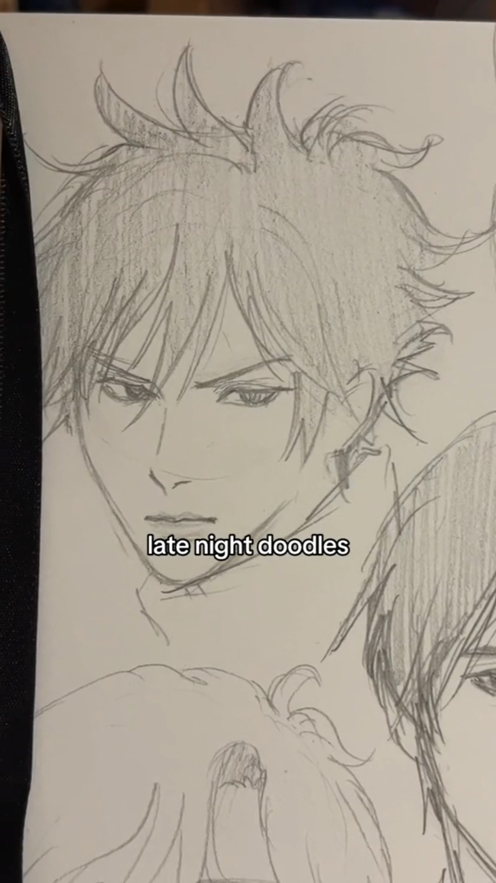 the image is a black and white sketch of an animestyle male character. he has spiky hair and a determined expression. the artist has labeled it "late night doodles". there are other partial sketches visible in the image, suggesting it's from a sketchbook page.