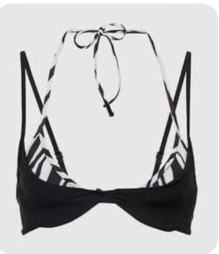 a black and white geometric print halter bikini top is shown against a white background. the bikini top has a tie closure at the neck and back.