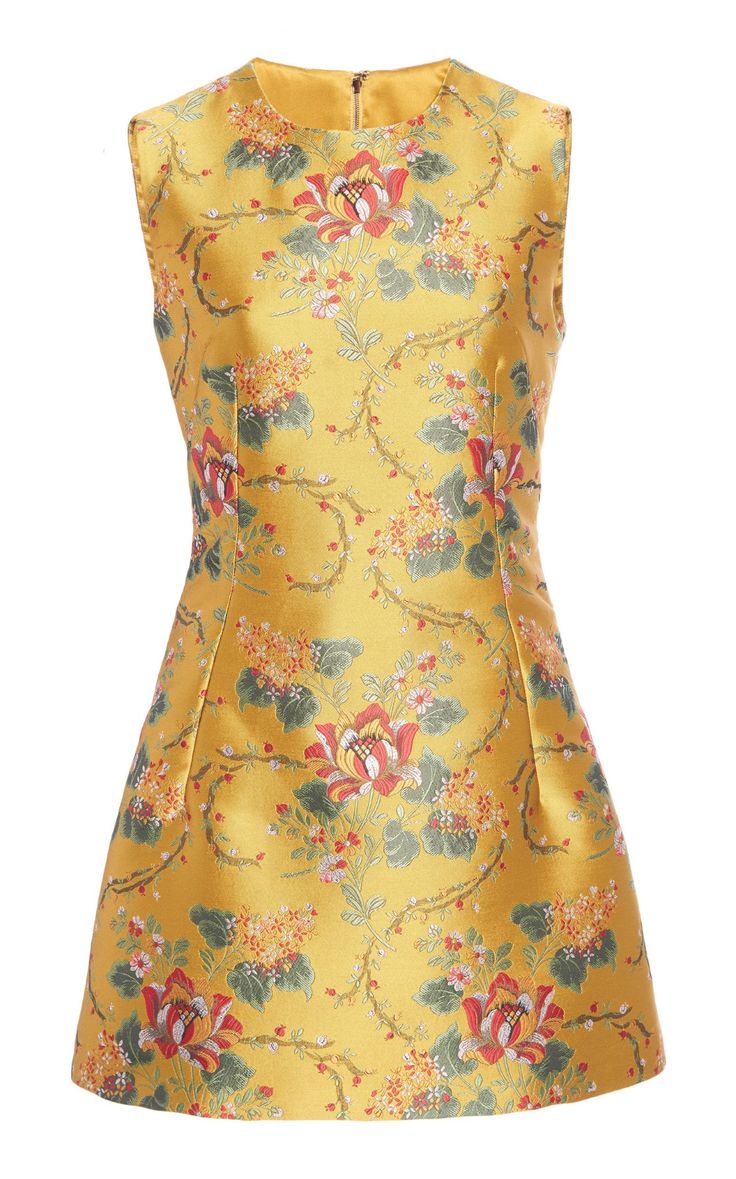 a gold, sleeveless aline dress with a floral jacquard pattern.