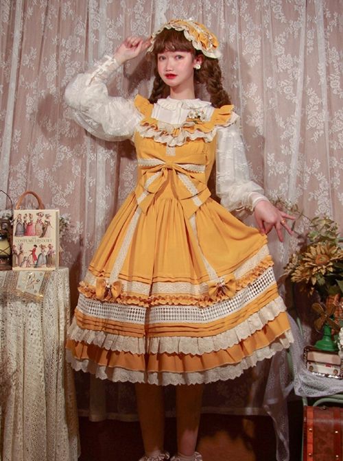 a young woman poses in a vintageinspired yellow dress with lace and ruffle details. she is wearing a matching bonnet and has her hair styled in pigtails. the environment suggests a room with vintage furniture and decor, emphasizing the romantic and feminine aesthetic.