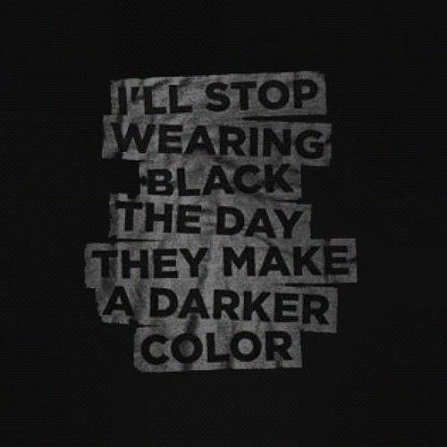 the image contains the quote "i'll stop wearing black the day they make a darker color" in white text against a black background. the text is presented as if it were pasted together from cutout letters, giving it a gritty and slightly distressed appearance.