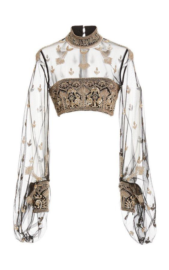 the image shows a black sheer crop top with long sleeves. the top is embroidered with gold thread in an intricate, ornate pattern. the neckline is high and the sleeves are balloonshaped. the fabric appears to be a delicate tulle. the overall style is elegant and sophisticated, with a hint of vintage inspiration.