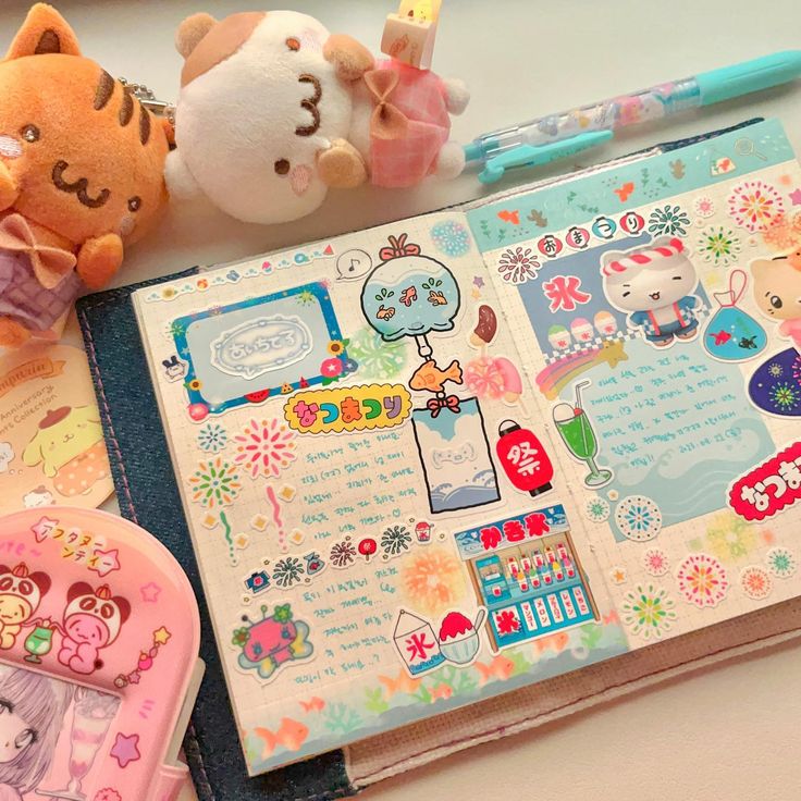 this image shows a closeup of a planner or scrapbook with a beautiful design and colorful stickers. it's decorated with stickers related to japanese summer festivals and themes, showcasing a cheerful and festive atmosphere. the stickers are all vibrant and cute, featuring elements like fireworks, ice cream, lanterns, traditional clothing, and japanese characters. the overall design creates a welcoming and playful vibe, suggesting a celebration of the summer season in japan.