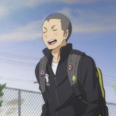 a drawing of a happy anime man with short hair and a backpack, he is standing outside with a fence behind him.