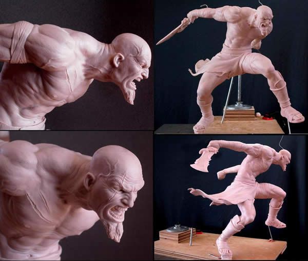 the image is a collage of four photos showing the sculpting process of a kratos figure, a character from the god of war video game series. the photos show the figure in various stages of completion, from the initial clay model to the nearly finished product. the sculptor is using clay tools to shape the figure's muscles, armor, and weapons.  each photo angle offers a different perspective of the sculpture.