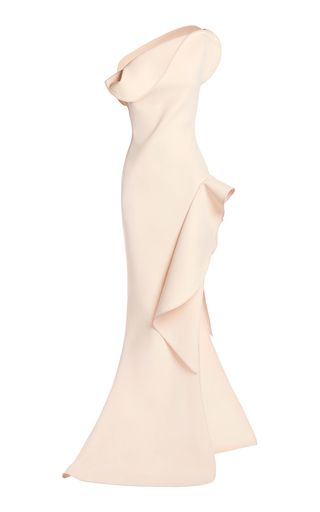 a  oneshoulder, sleeveless, long white dress with a ruffle flowing down one side.