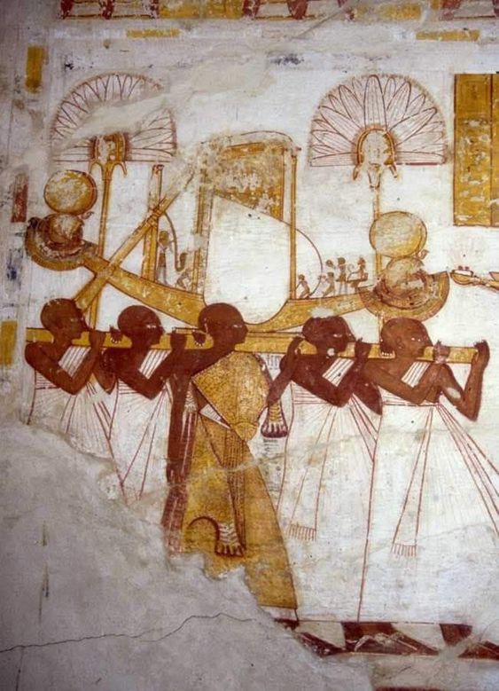 the image depicts a scene from an ancient egyptian tomb painting.  a group of mourners carry a sarcophagus on their shoulders.  they are likely priests or family members of the deceased. above the sarcophagus are various offerings, including food and perhaps incense burners. the style of the painting is characteristic of ancient egyptian art with its flat perspective and stylized figures. the scene depicts an important aspect of ancient egyptian culture, the elaborate rituals and beliefs surrounding death and the afterlife.