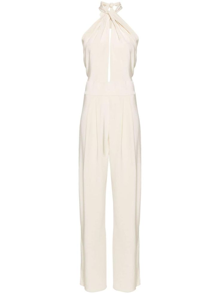a white halter jumpsuit with a wideleg silhouette and silky fabric. it features a flowy and elegant design, perfect for evening wear or formal occasions. the sleeveless bodice and halter neckline create a flattering look. this jumpsuit is ideal for spring and summer events.