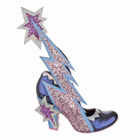 a highheeled novelty shoe with a blue and purple color scheme, adorned with glitter and shaped like a lightning bolt and a star. the shoe has a purple crocodile pattern on the main body, a glittercovered heel, and a large lightning bolt that extends upwards from the back of the shoe, ending in a star.