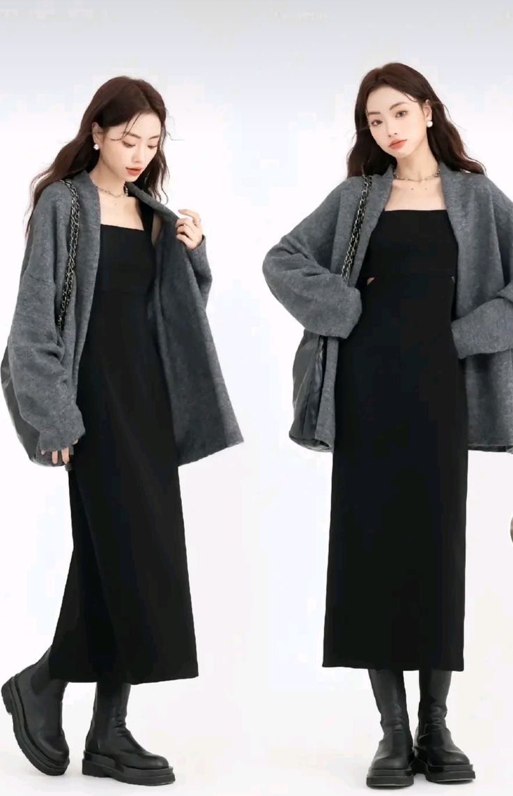 he image shows two women wearing the same outfit. both are wearing a grey oversized cardigan over a black midi slip dress and black ankle boots.  they are posed against a white background, showing the outfit from different angles.  one woman is slightly turned to the side, while the other is facing forward.  both women appear to be models, and their poses and expressions suggest a fashion shoot.