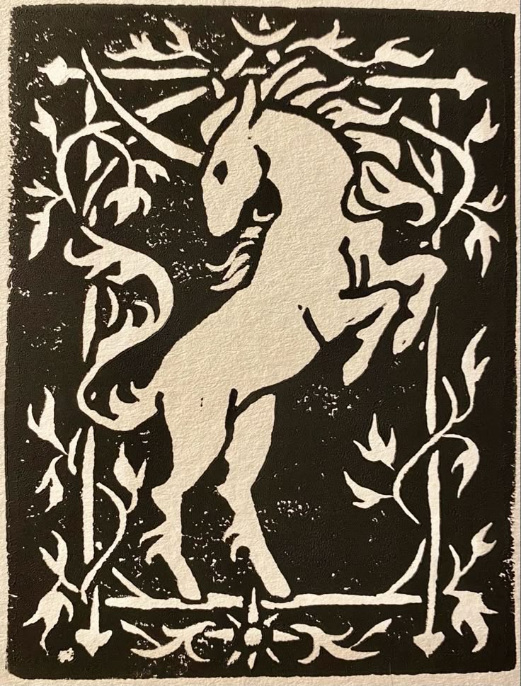a black and white woodcut style illustration featuring a rearing unicorn surrounded by vines and foliage. the unicorn is depicted in a heraldic pose, with its front legs raised. the design has a medieval or fantasy feel.