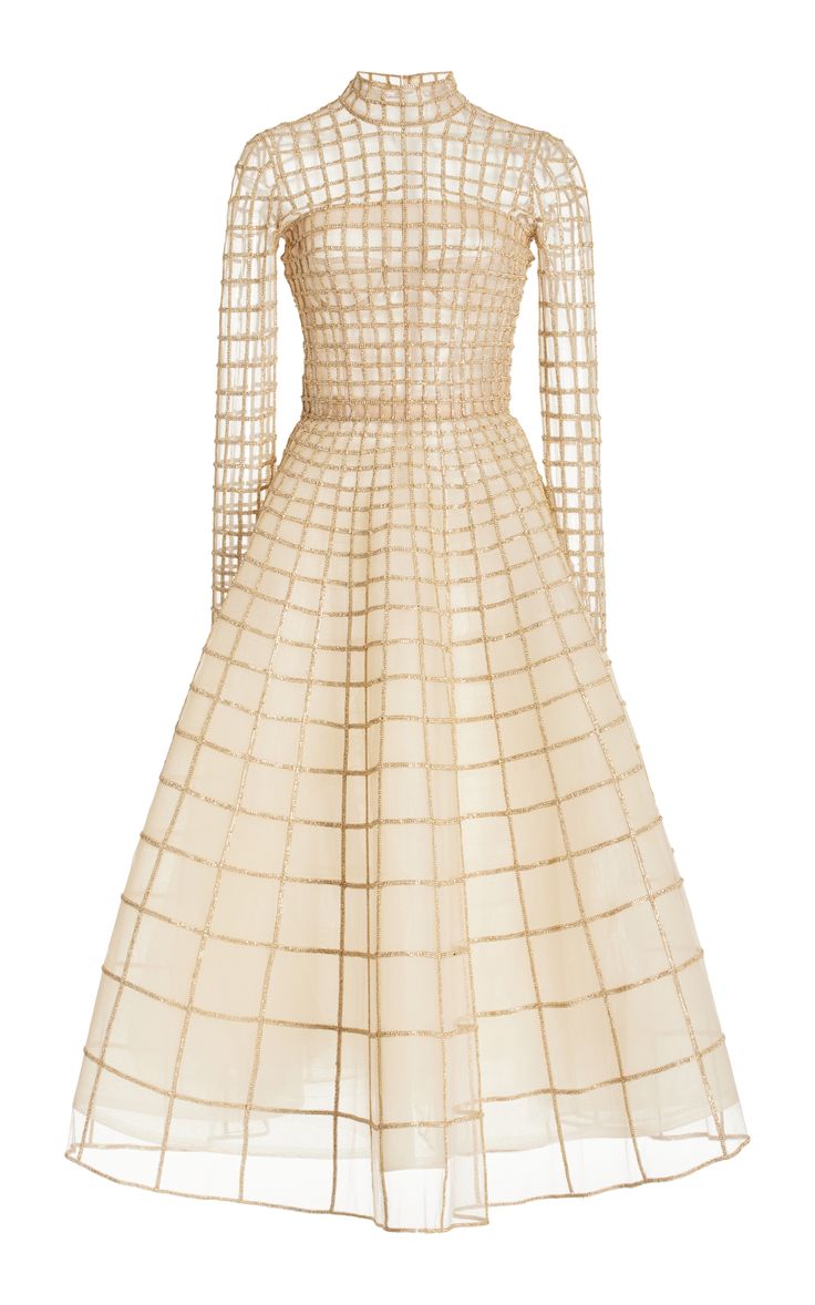 a beige midi dress with a high neckline and long sleeves is shown. the dress has a grid pattern overlaying the entire design.