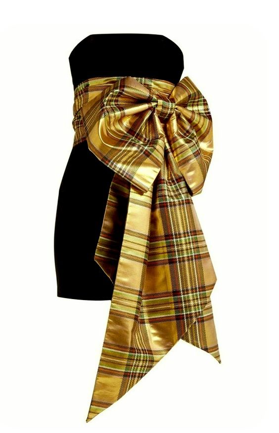 a black strapless dress with a large gold tartan bow.
