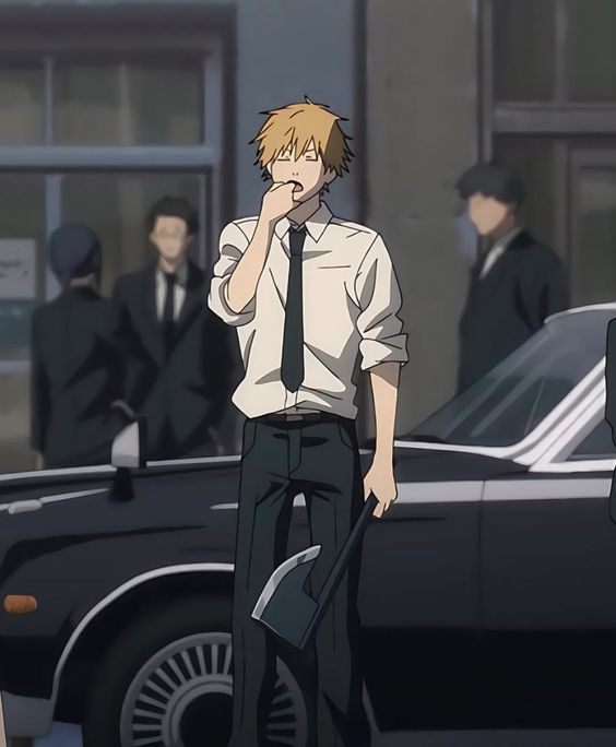this image shows an anime character, a young blond man in a white dress shirt and dark pants, standing on a city street. he's holding a large axe in his left hand, and his right hand is raised to his mouth. he appears tired or bored. there are other men in suits and a black car behind him. the overall color palette is muted and somewhat dark.