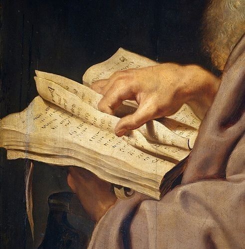 a closeup painting depicts a person holding and reading an old, open book. the book is filled with dense text written in a classical script. the person's hand is resting on the pages, suggesting they are in the process of turning them. the lighting in the painting is dramatic, with a strong contrast between light and shadow, emphasizing the texture of the paper and the wrinkles on the person's hand. the overall impression is one of scholarship and historical significance.
