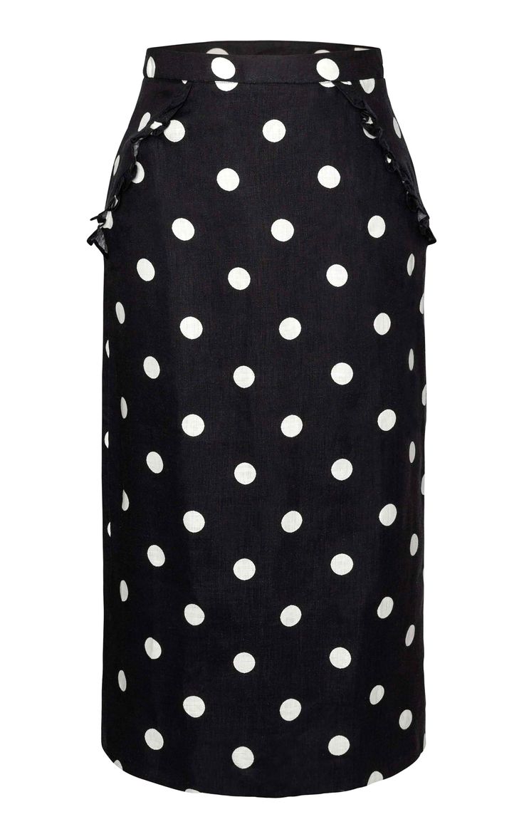 a black midi skirt with a white polka dot pattern and ruffle detailing. it has a fitted silhouette and is perfect for spring and summer occasions.
