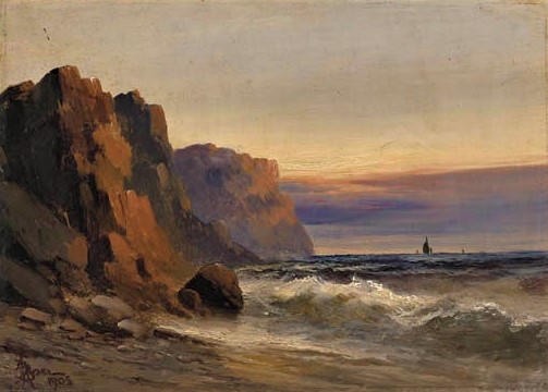 this is a landscape painting of a rocky coastline at sunset. on the left, a large cliff formation dominates the scene, with various shades of brown, orange, and dark colors depicting its rugged surface. the cliffs are situated along a beach with scattered rocks. to the right, the ocean stretches out towards the horizon, with waves crashing against the shore. in the distance, a few small boats can be seen on the water. the sky is a blend of colors, with oranges and pinks near the horizon, transitioning to a more muted tone higher up. the overall impression is one of a serene yet powerful coastal scene. the painting is signed and dated 1905 in the lower left corner.