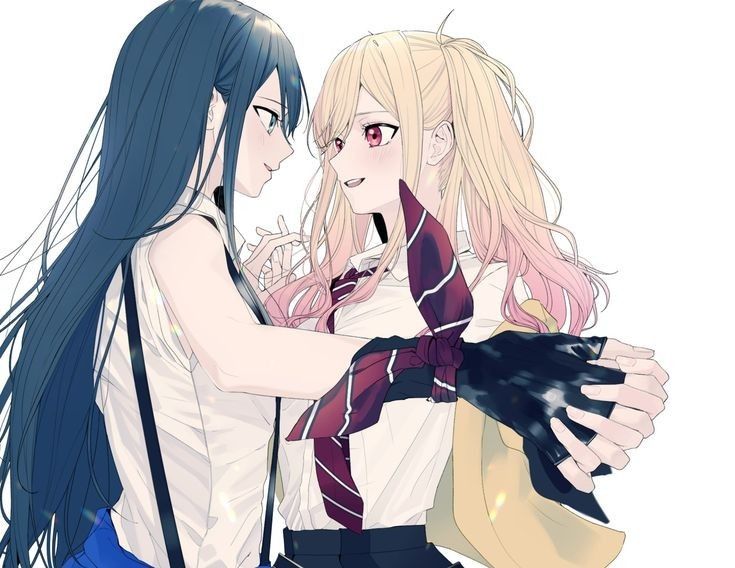 the image shows two anime girls in school uniforms hugging each other. the girl on the left has long, dark blue hair and is wearing suspenders with a white shirt and blue skirt. the girl on the right has long blonde hair that fades into pink at the ends, red eyes, and is wearing a loosely tied tie with a white shirt and black skirt. they are both smiling and looking at each other. they are marin kitagawa and shizukutan.