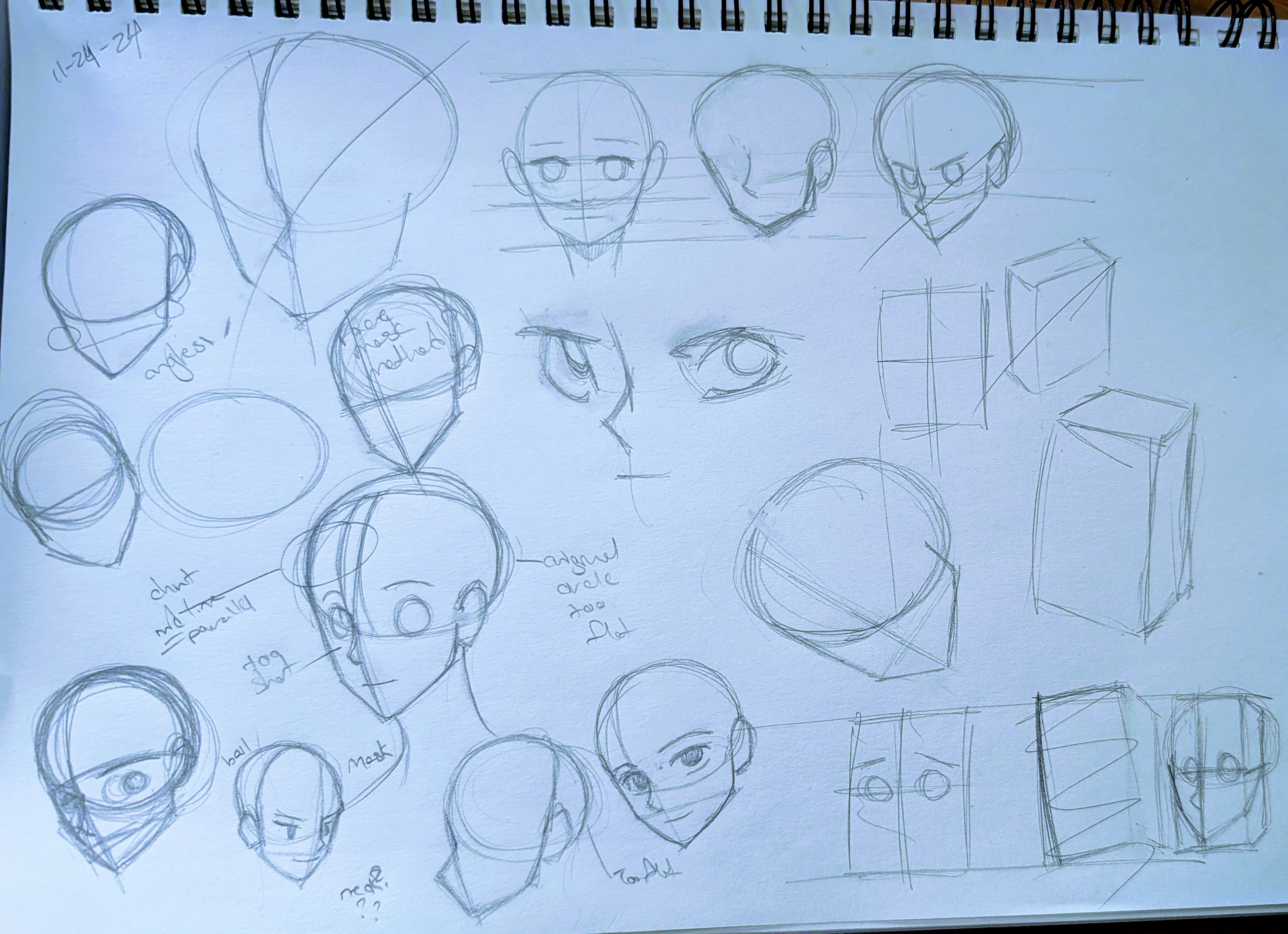 the image is a sketchbook page filled with various pencil sketches focusing on head and face construction.  there are numerous attempts at drawing heads from different angles, with varying degrees of detail.  some sketches include basic geometric shapes (cubes, spheres, ovals) used as underlying forms for the heads.  the artist has added notes and annotations to many of the drawings, indicating observations about angles, proportions, and shapes, such as "angled angle too flat",  "chin meets parallel", "angless".  the style suggests practice in drawing anime or mangastyle heads.  the overall impression is one of a workinprogress, showing the artist's process of learning and refining their skill.