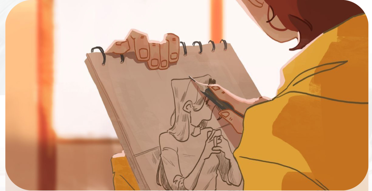 a woman with brown hair wearing a mustard yellow jacket sits indoors, drawing a sketch of another woman in a sketchbook. the sketch is a portrait showing a woman from the shoulders up looking to her right, holding a phone to her ear. the lighting is soft and warm, likely coming from a window offscreen to the left. the perspective is over the shoulder of the artist, giving the viewer a glimpse into her creative process.