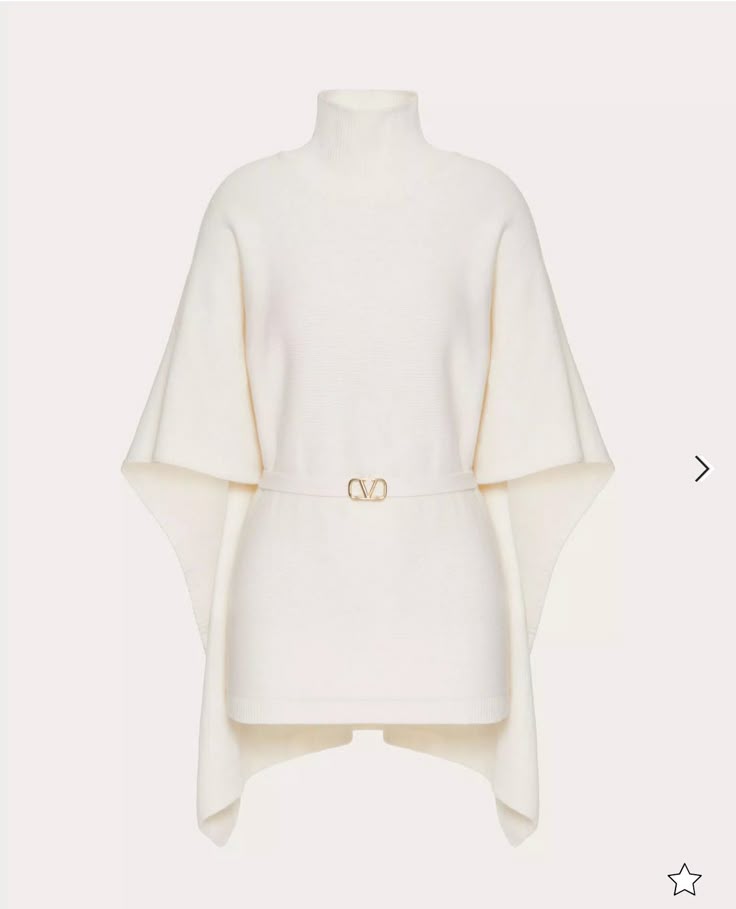 a white valentino turtleneck poncho with a vlogo signature belt.