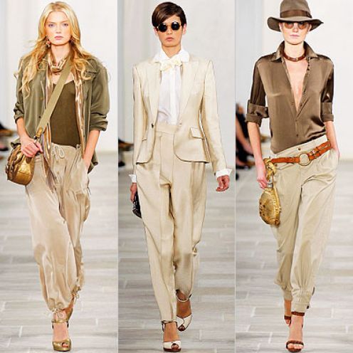 the image shows three models showcasing different styles of beige and khaki clothing on a runway, likely from a ralph lauren collection.  the styles range from a relaxed, casual jumpsuit look on the left, to a more tailored, sophisticated pantsuit in the center, and a relaxed, safariinspired outfit with a blouse and pants on the right. each model is accessorized with bags, sunglasses (in two cases), and a hat (in one case), all in a cohesive color scheme. the overall aesthetic suggests a spring/summer collection with a blend of casual and formal elements. the models appear to be walking the runway for a fashion show.