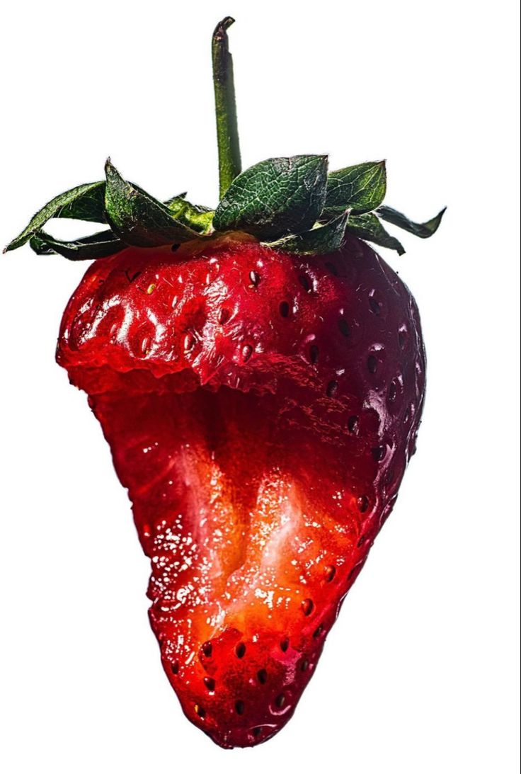 a single, ripe red strawberry is isolated against a white background. the strawberry is glossy and juicy, with a vibrant red color. the strawberry's texture is clearly visible, with small seeds and a slight indentation where the stem was removed. the image is a closeup, capturing the beauty and detail of the strawberry.
