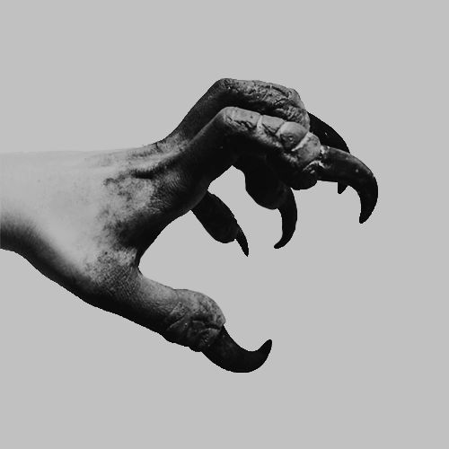 the image shows a black and white grayscale image of a monster hand with sharp claws. the hand appears to be humanoid in shape but with the addition of talons or claws on the fingers. it is a creepy and ominous image, likely representing a fantasy creature or monster.