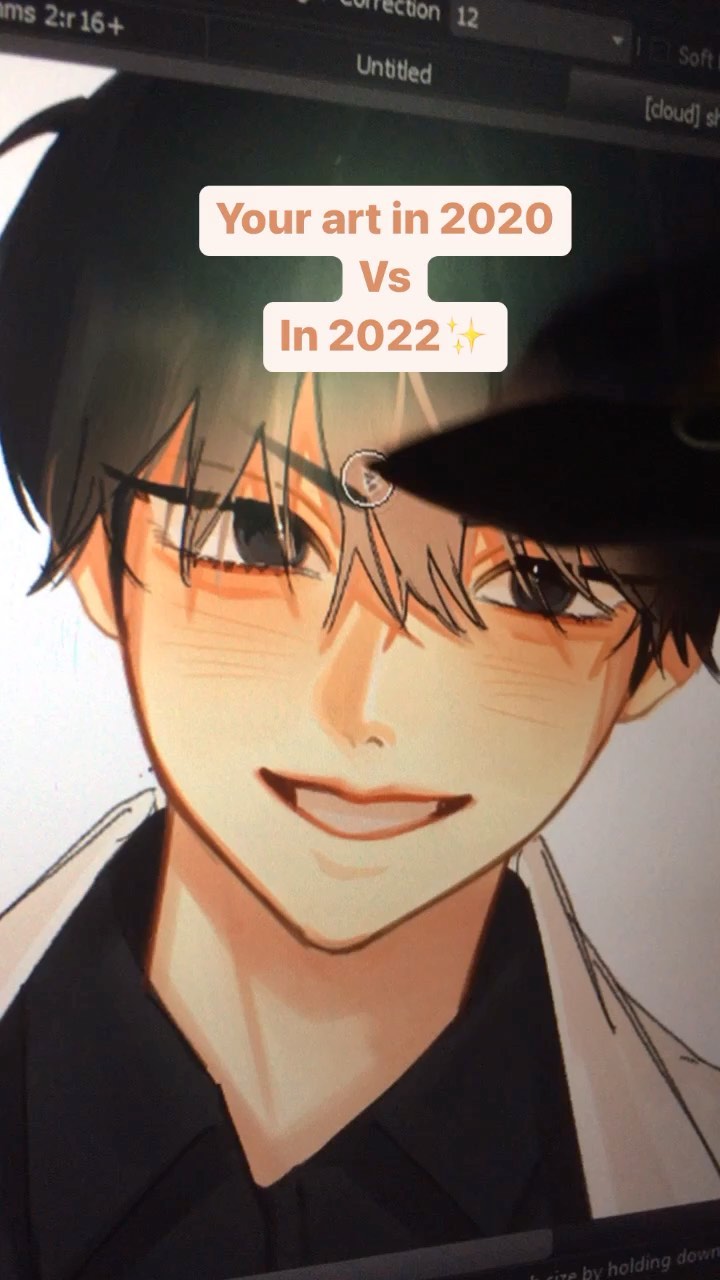 he image shows a beforeandafter comparison of a digital drawing of an animestyle boy's face. the top part displays text that says, "your art in 2020 vs in 2022," showcasing the artist's improvement over two years. the main focus is on the detailed portrait of the anime character, depicting the evolution of the artist's style and skills.  the image shows a work in progress, with some lines and colors still in development. the artist appears to be using a stylus on a digital drawing tablet.