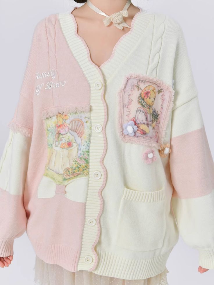 the image showcases a woman modeling a charming pink and cream cardigan. the cardigan boasts a patchwork design with embroidered details, featuring adorable teddy bear motifs and delicate floral accents. the oversized fit and soft knit suggest a cozy and warm garment perfect for fall or winter. the image highlights the cardigan's unique style, blending elements of vintage and kawaii aesthetics.