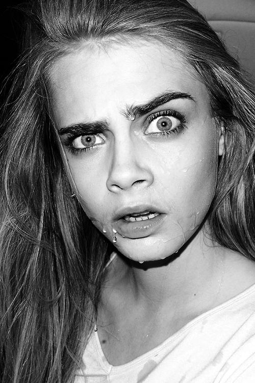 a black and white portrait of a young woman, her hair framing her face, with a scared expression.  her mouth is slightly open and her eyes are wide with tears streaming down her cheeks.