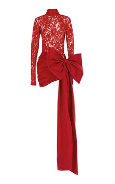 a red lace dress with a long sleeve and a high neck. the dress has a large red bow at the waist and a long train. the model is wearing the dress. the background is white.